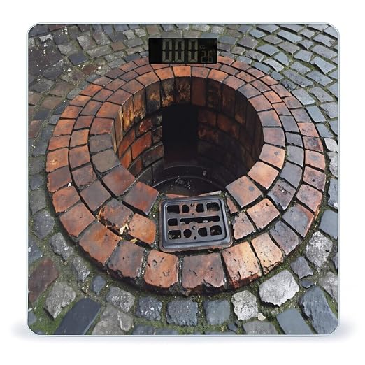 Circular Brick Drain With Metal Grate